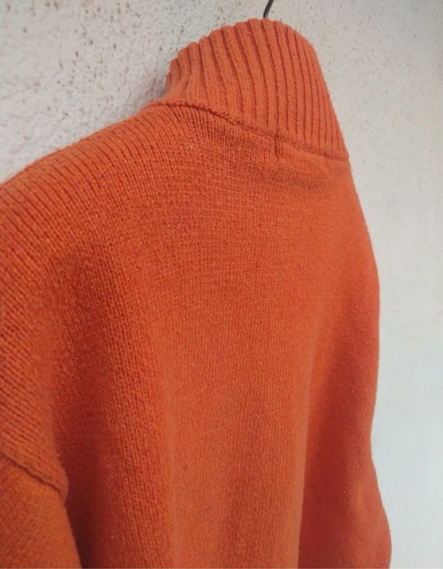 Maglione con cerniera arancione