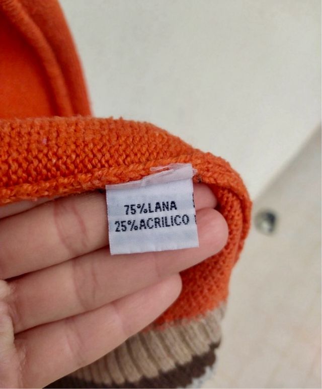 Maglione con cerniera arancione