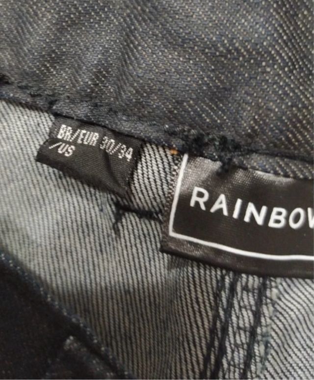 Jeans nero con bottoni