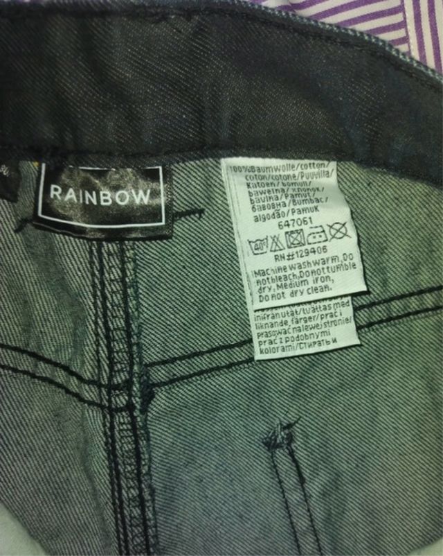 Jeans nero con bottoni