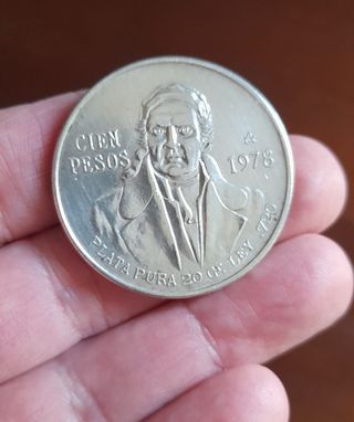 Moneda antigua de plata de 100 pesos