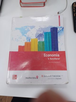 Economia 1 BACH MED. Libro del alumno y Smartbook (Catalan Edition)