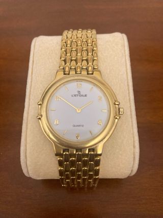 Reloj de pulsera chapado oro l’etoile.