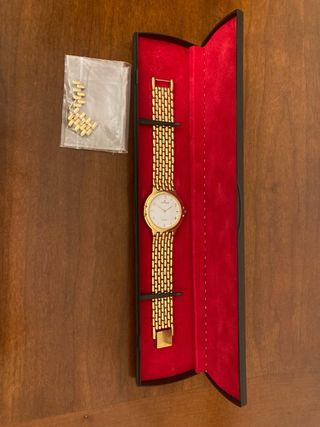 Reloj de pulsera chapado oro l’etoile.