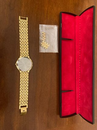 Reloj de pulsera chapado oro l’etoile.