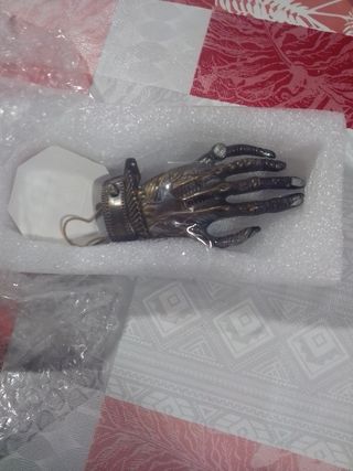 Ebilla de cinturón forma de mano 