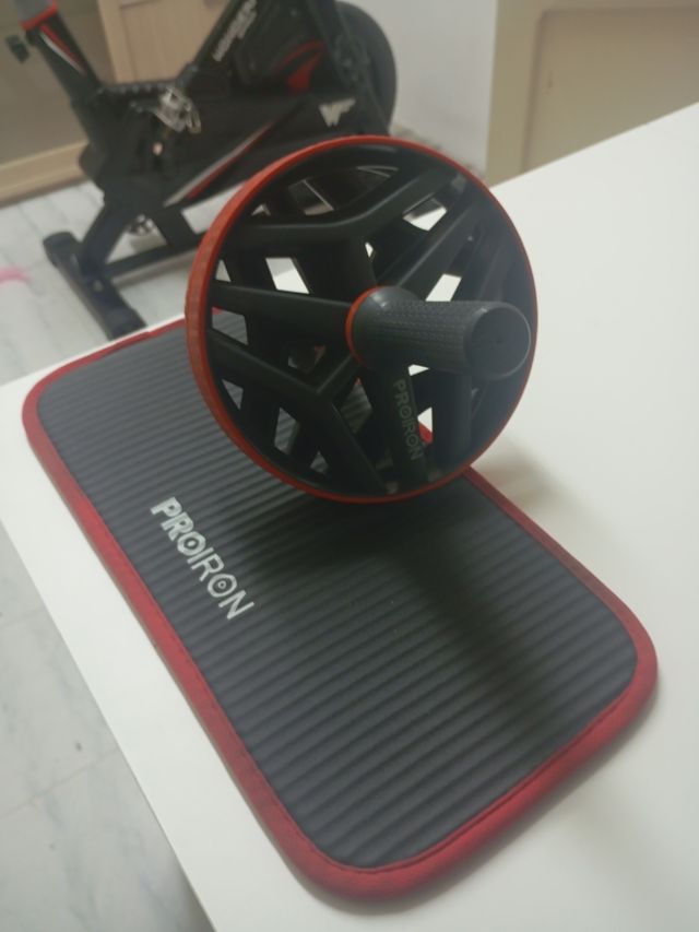 Se vende rueda y agarres para gimnasia