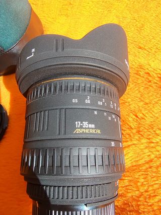 Objetivo SIGMA-filtro UV, parasol, tapas, estuche