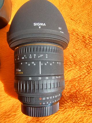 Objetivo SIGMA-filtro UV, parasol, tapas, estuche