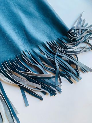 Falda de piel con flecos  estilo boho chic