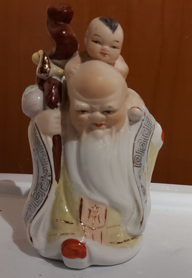 Statua Di Buddha In Porcellana