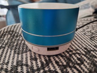 Mini altavoz portátil