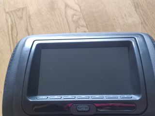 Reposa cabezas nuevos con pantallas DVD