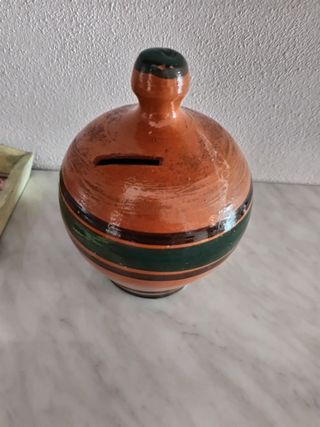 Salvadanaio in terracotta