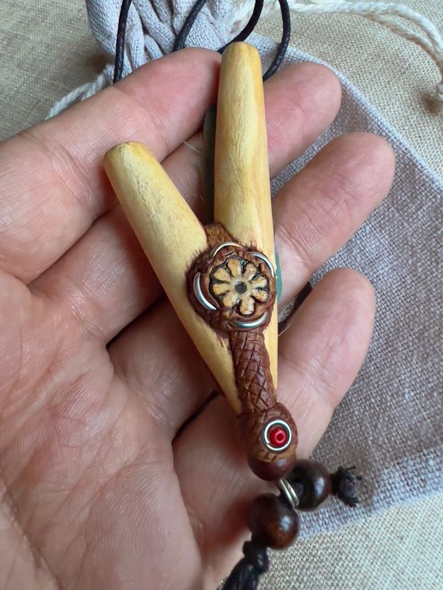 Kuripe palosanto y plumas