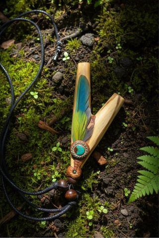 Kuripe palosanto y plumas