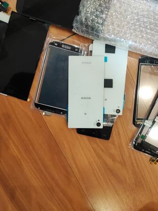 4 cajas pantallas telefonos
