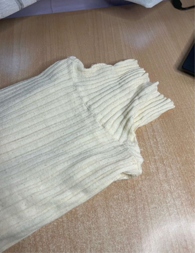 Jersey cuello alto blanco roto