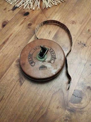 cinta metrica Leder kapsel