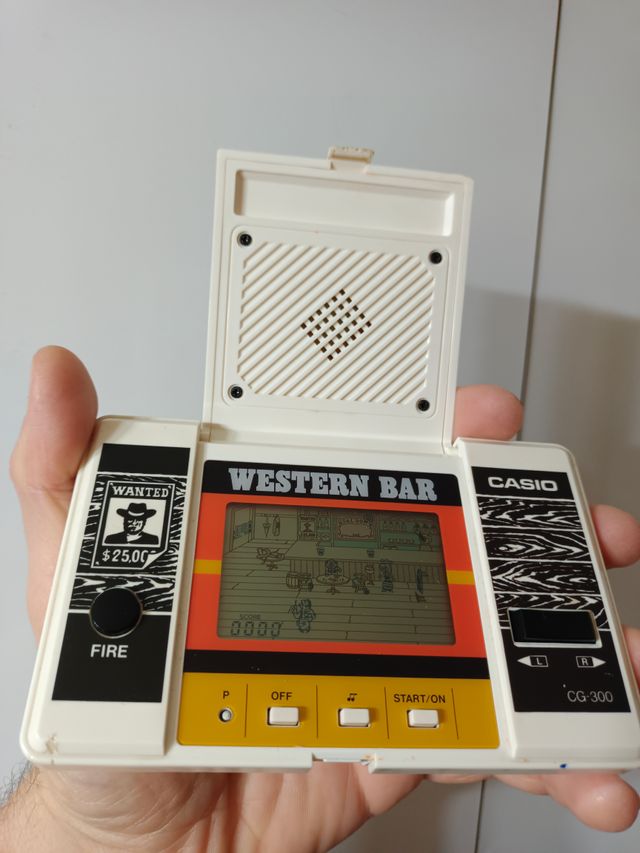 Maquinita , consola western bar casio game watch