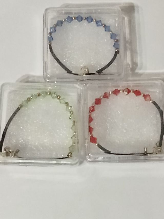 numero3 braccialetti caucciù brillantini e metallo