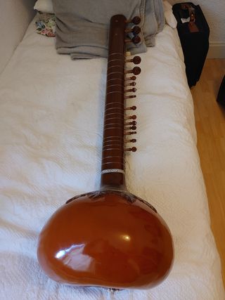 Sitar por guitarra