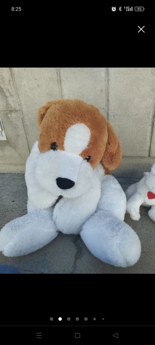 Grande cane di peluche