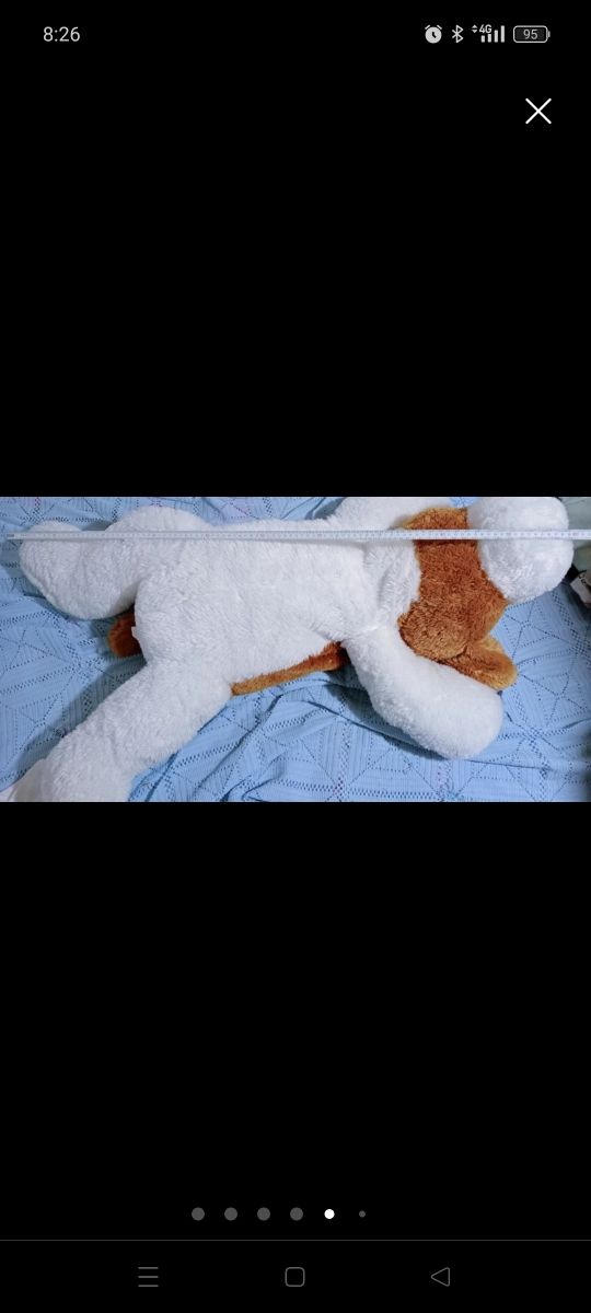 Grande cane di peluche