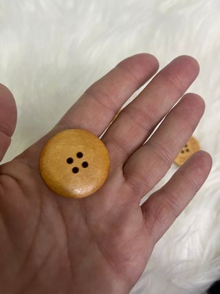 Botón UGG precio unidad