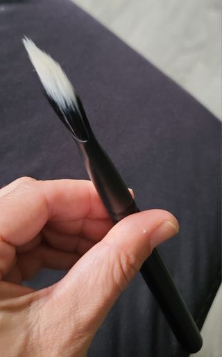 Brocha maquillaje Estee Lauder.