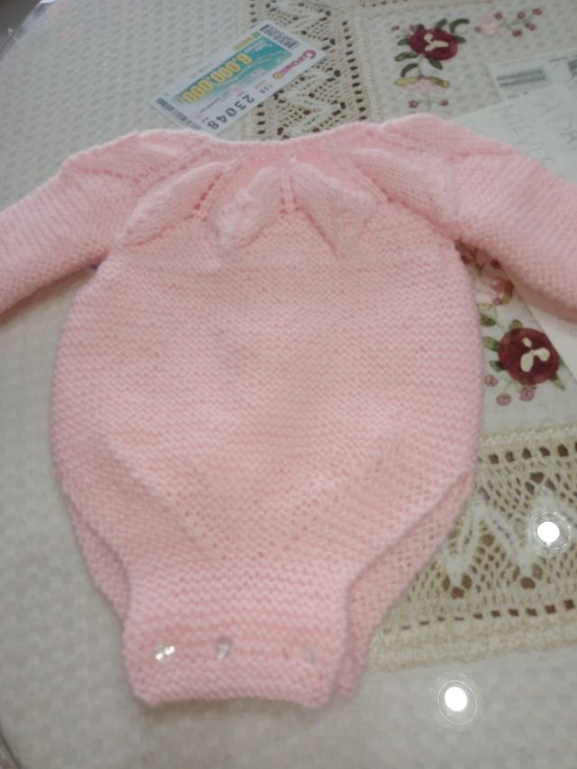 Toca bebe y ropita echa a mano