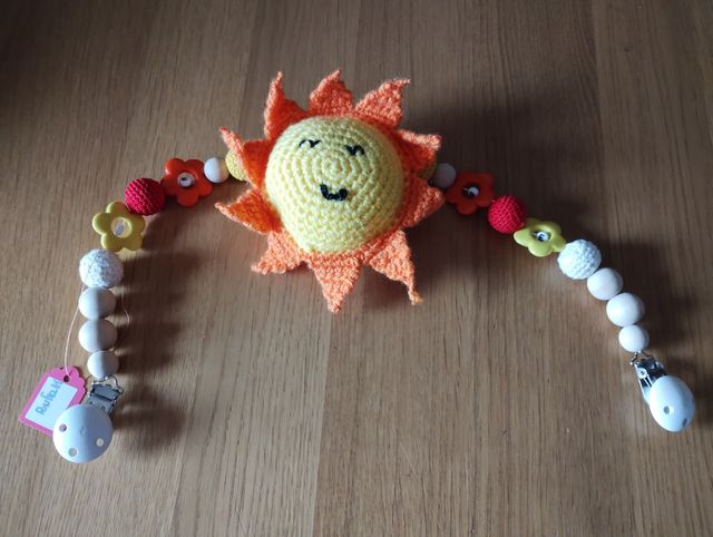 Colgador motivo un sol