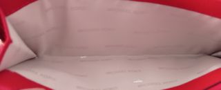 Cartera roja Michael Kors jet set