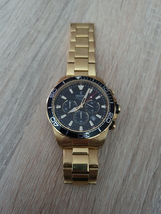 Reloj oro