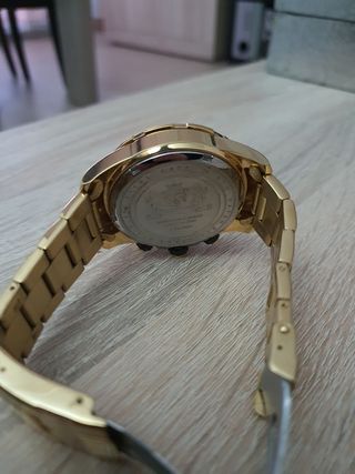 Reloj oro