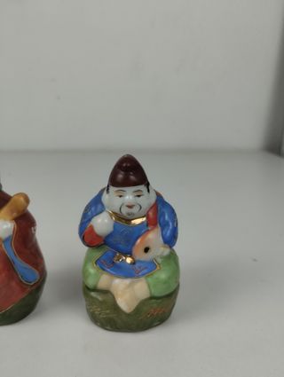 Sabios chinos, porcelana. Budas