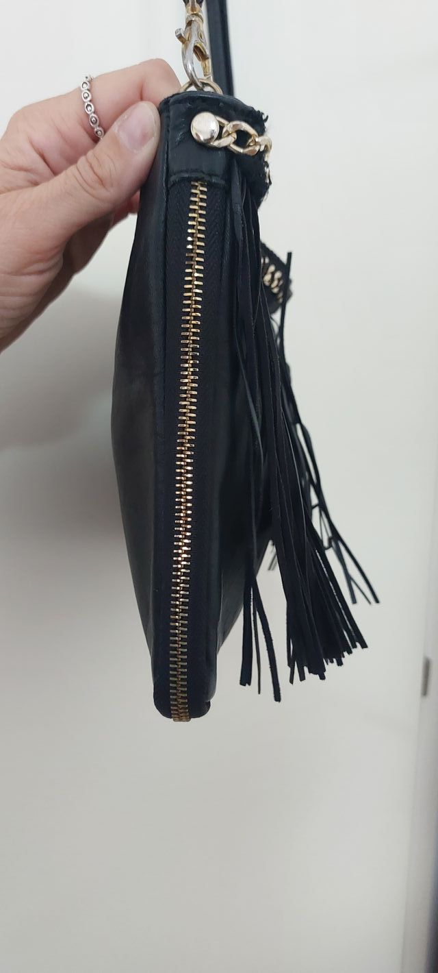 Borsetta in pelle con frange