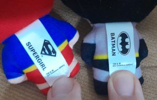 Peluche di Batman e Supergirl