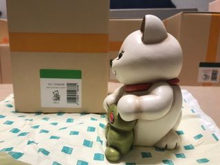 gatto salvadanaio con quadrifoglio