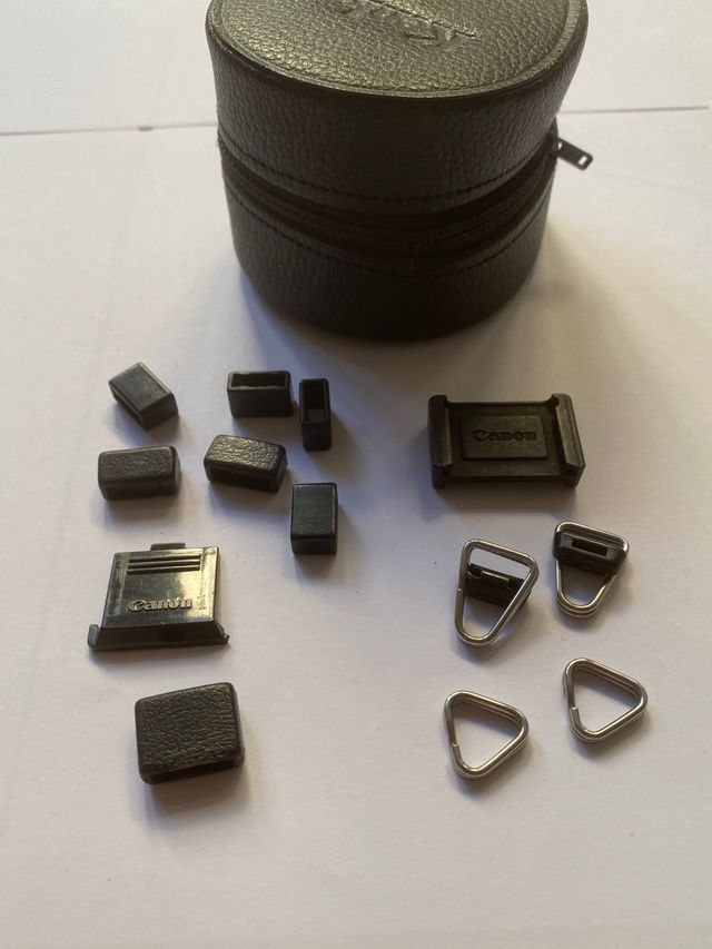 Canon A1 AE1 ganchitos correas varias