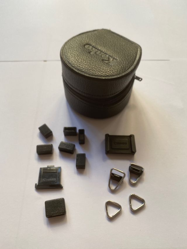 Canon A1 AE1 ganchitos correas varias