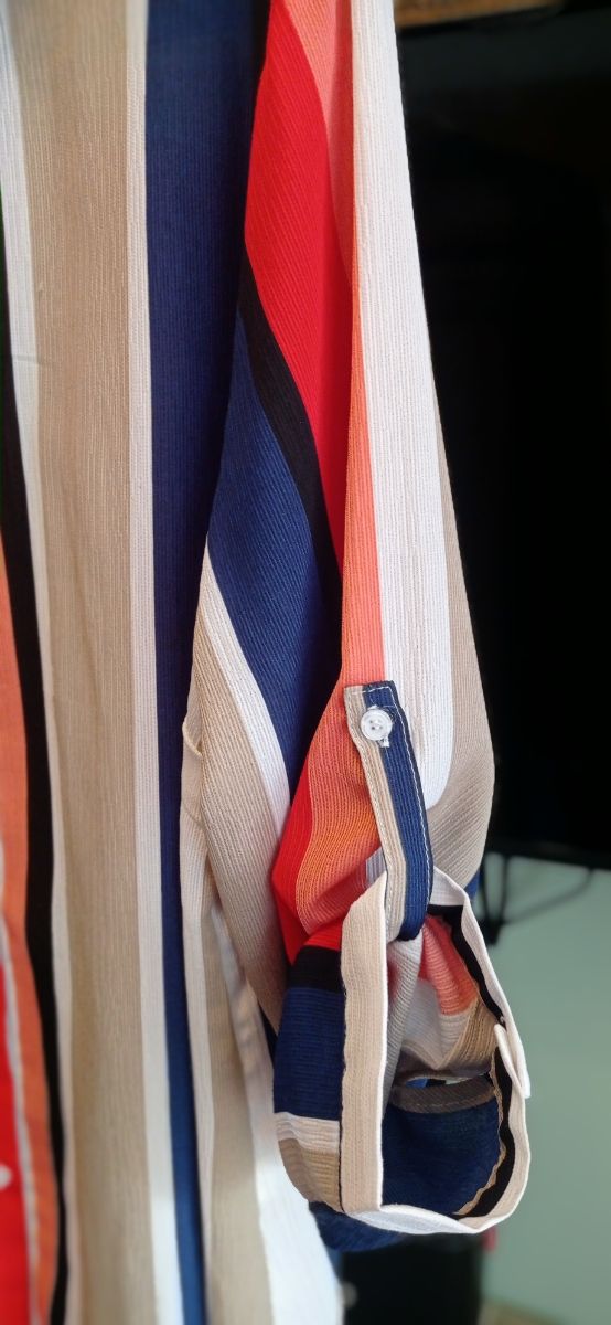 Camisa nueva con mangas ajustable