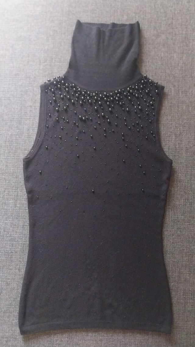 Sottogiacca smanicato collo alto 