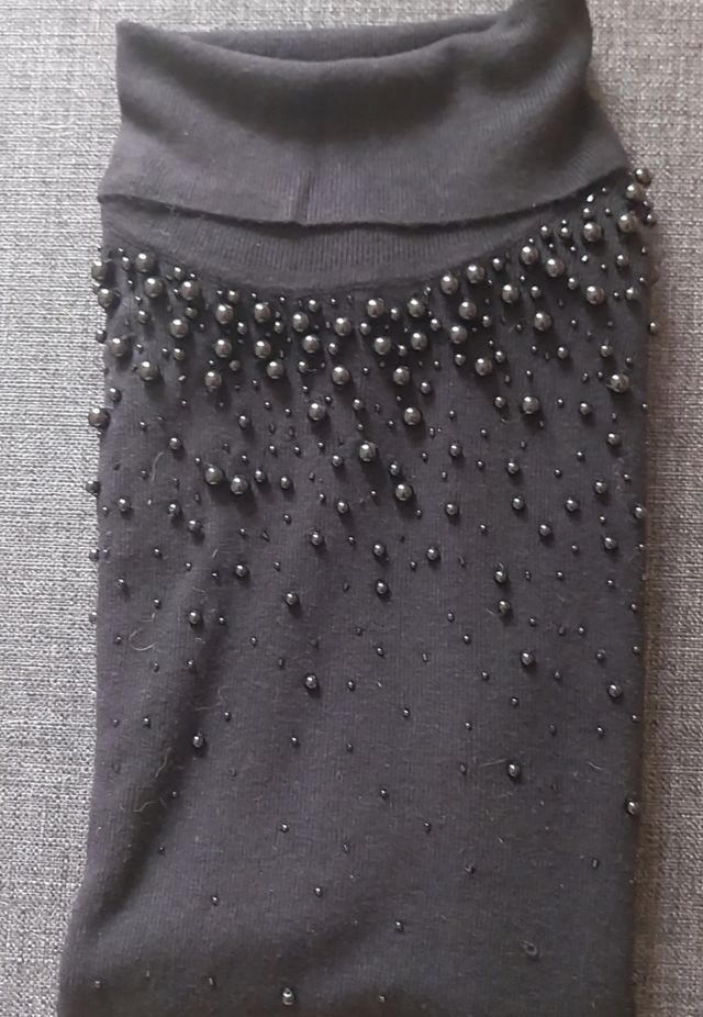 Sottogiacca smanicato collo alto 