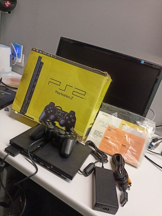PS2 slim en caja