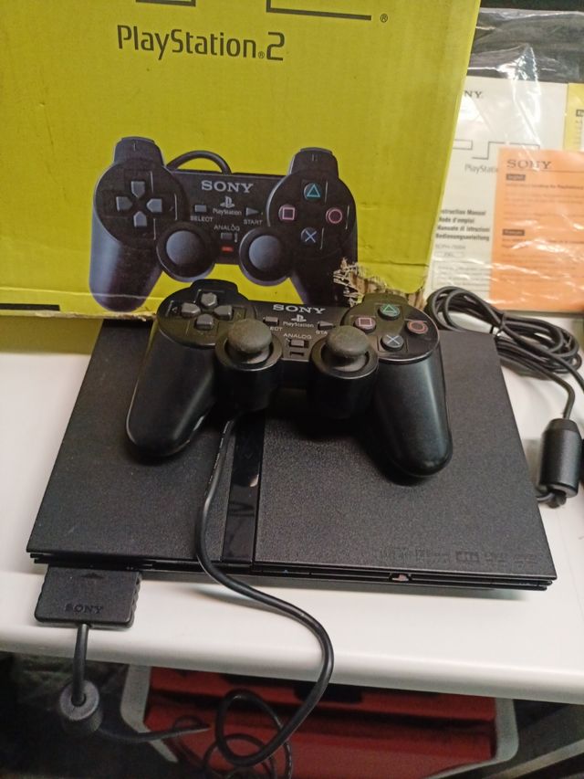 PS2 slim en caja