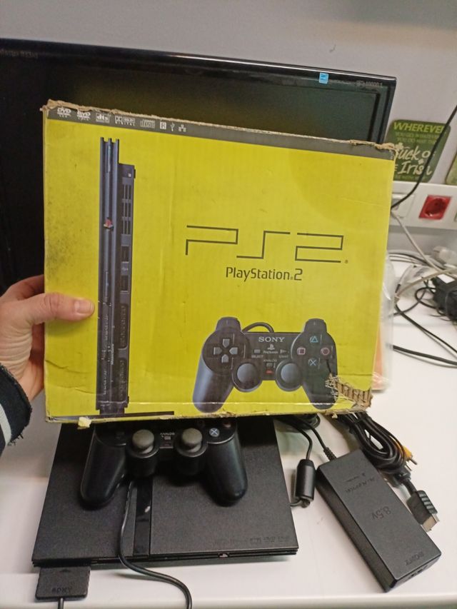 PS2 slim en caja