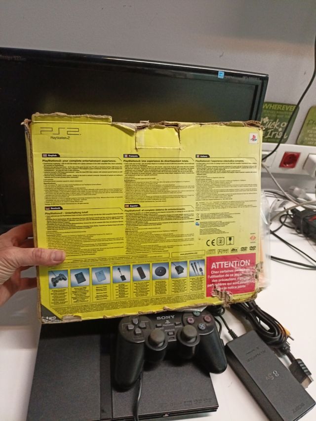 PS2 slim en caja