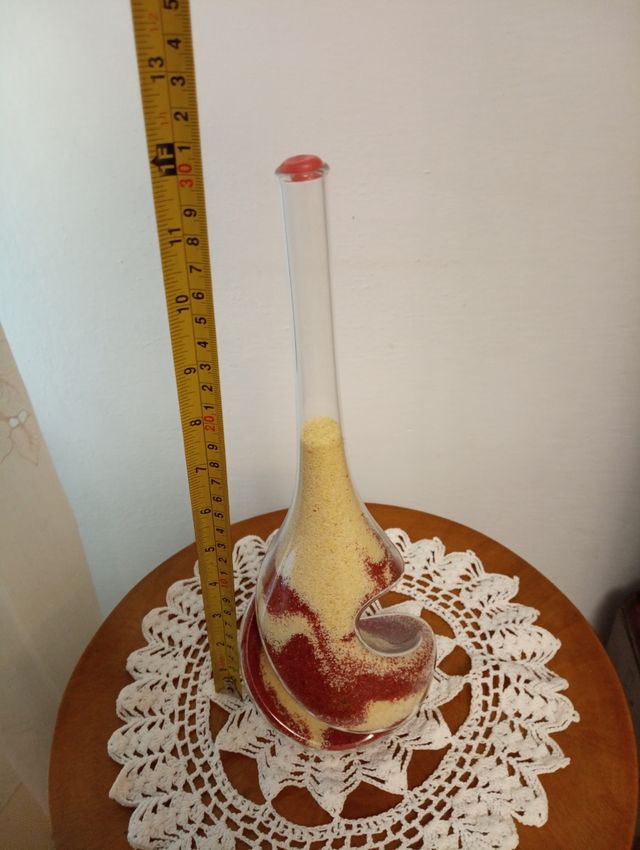 Bottiglia in vetro molto lavorata