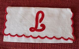 Buste porta tovagliolo e porta posate ricamate